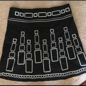 Black and white embroidered mini skirt